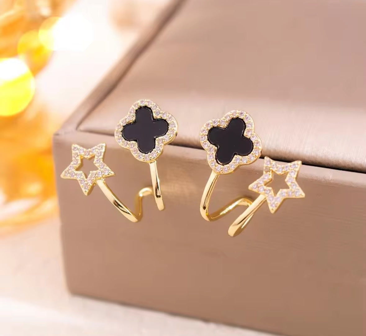 Black Clover & Star Duo Earrings – Golden Mismatched Crystal Studs for Women