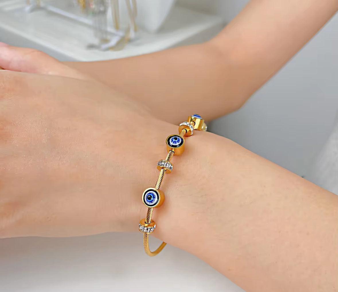 Golden Evil Eye Bracelet – Adjustable Cable Bangle with Crystal Accents