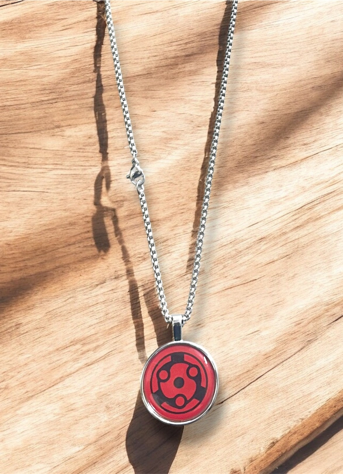 Uchiha Clan Sharingan Necklace – Naruto Inspired Pendant for Anime Fans