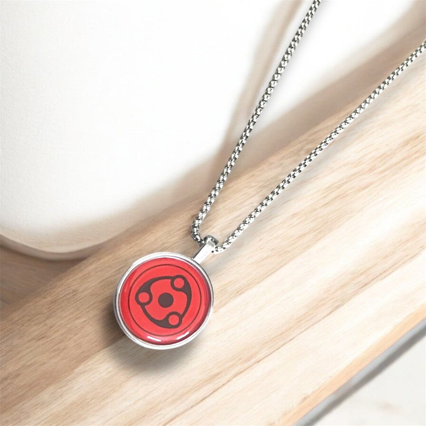 Uchiha Itachi Mangekyō Sharingan Necklace – Naruto Anime Pendant