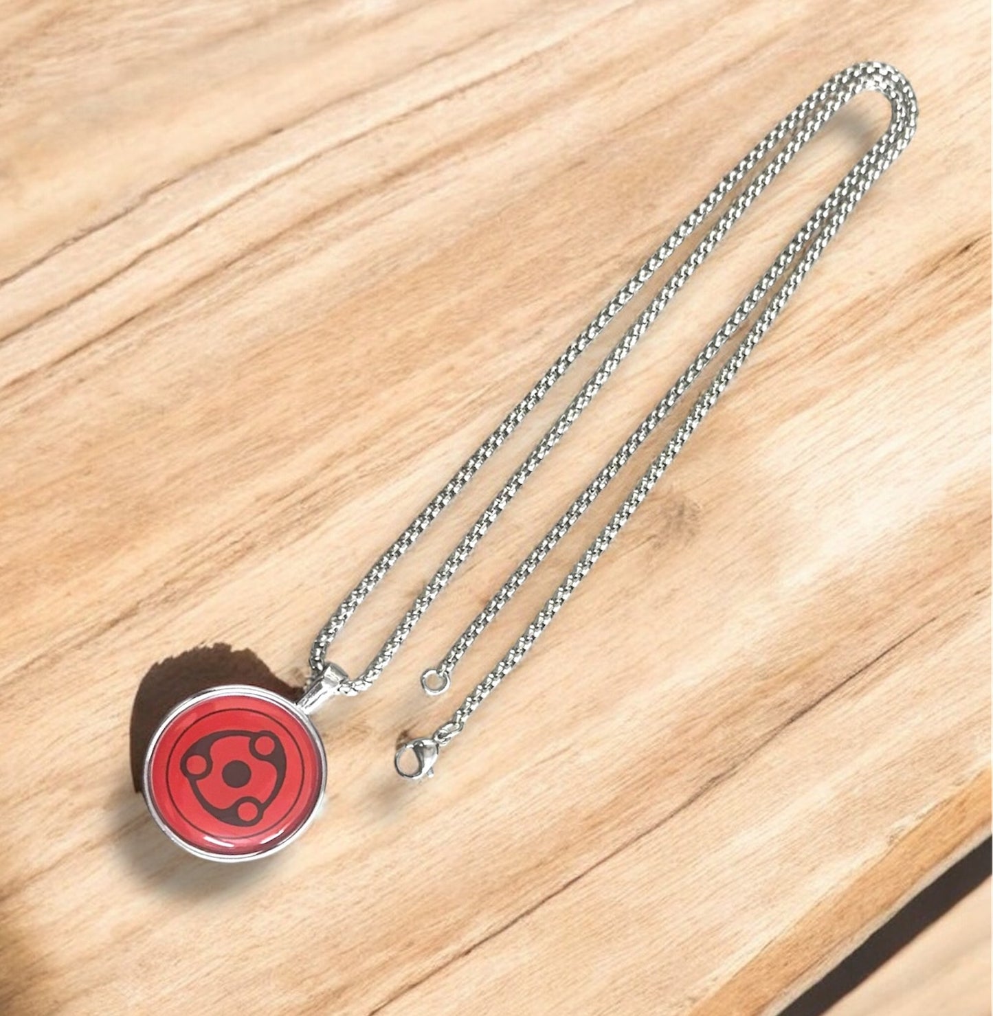 Uchiha Itachi Mangekyō Sharingan Necklace – Naruto Anime Pendant
