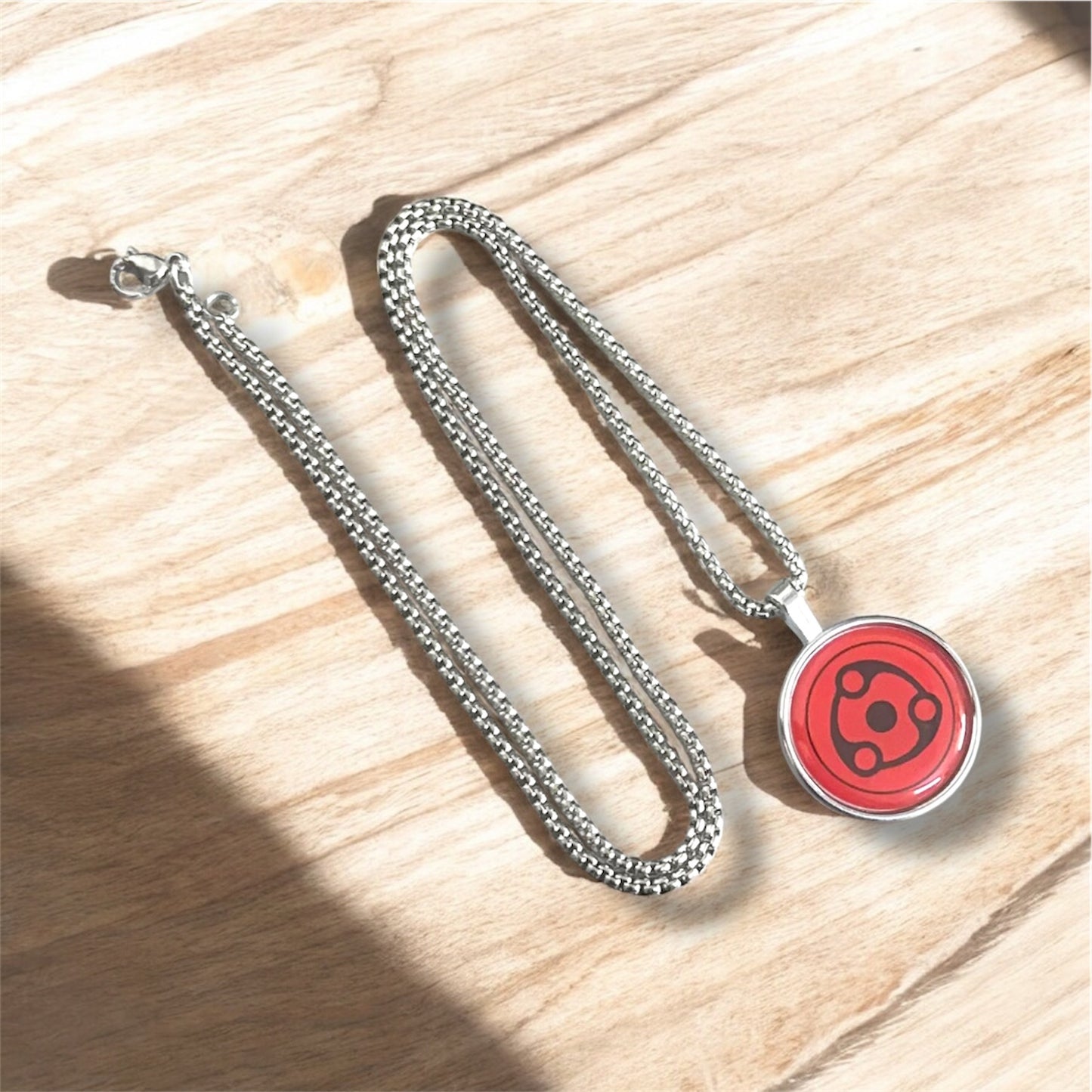 Uchiha Itachi Mangekyō Sharingan Necklace – Naruto Anime Pendant