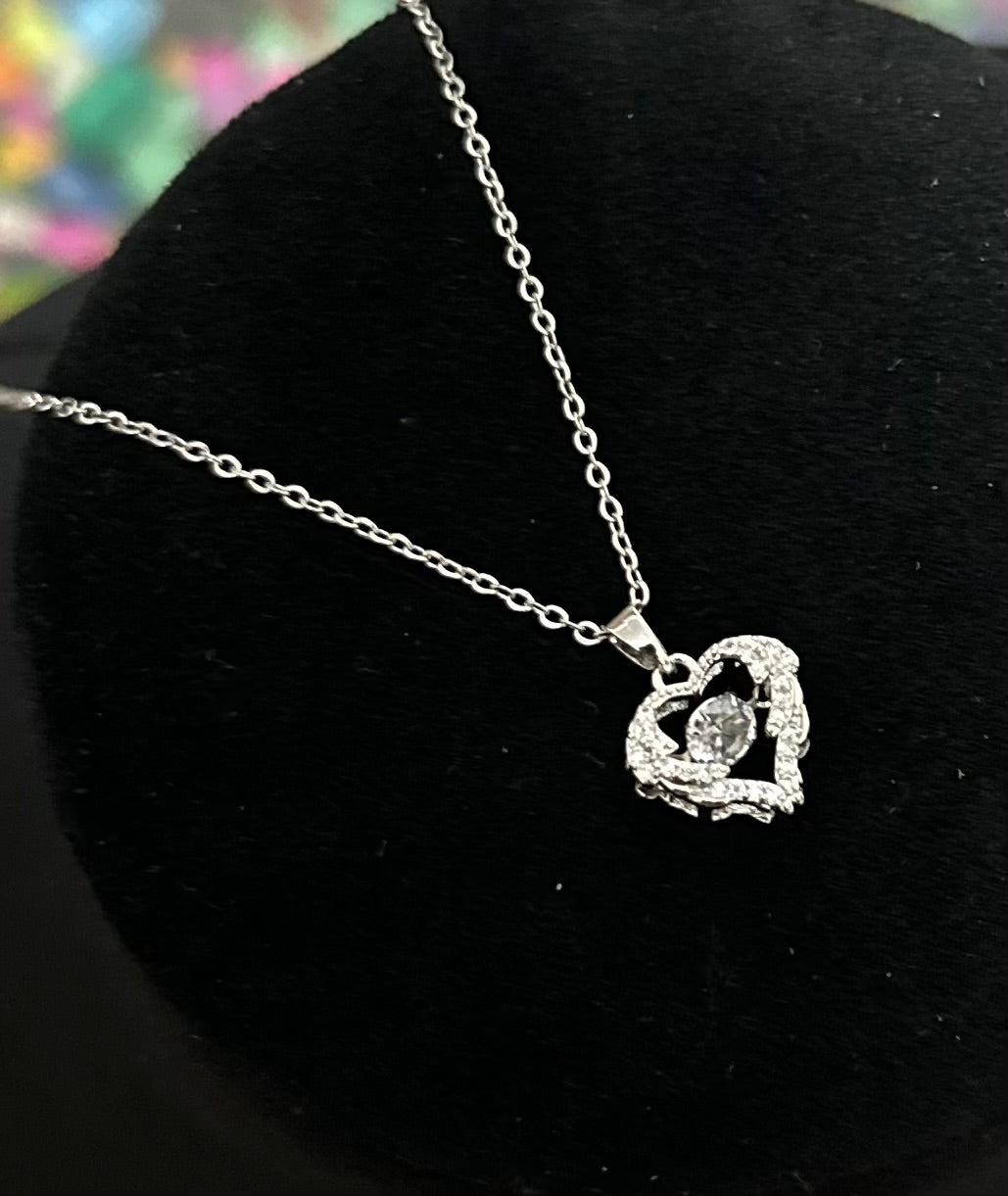 "Elegant Heart Pendant: Timeless Love, Unmatched Style"