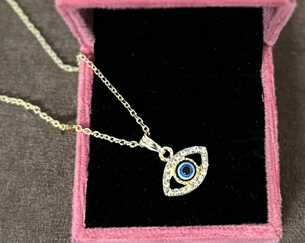 Timeless Guardian: Metal Evil Eye Pendant