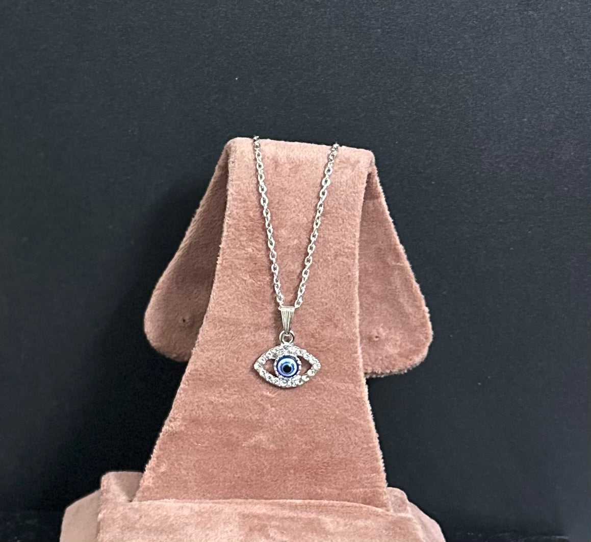 Timeless Guardian: Metal Evil Eye Pendant