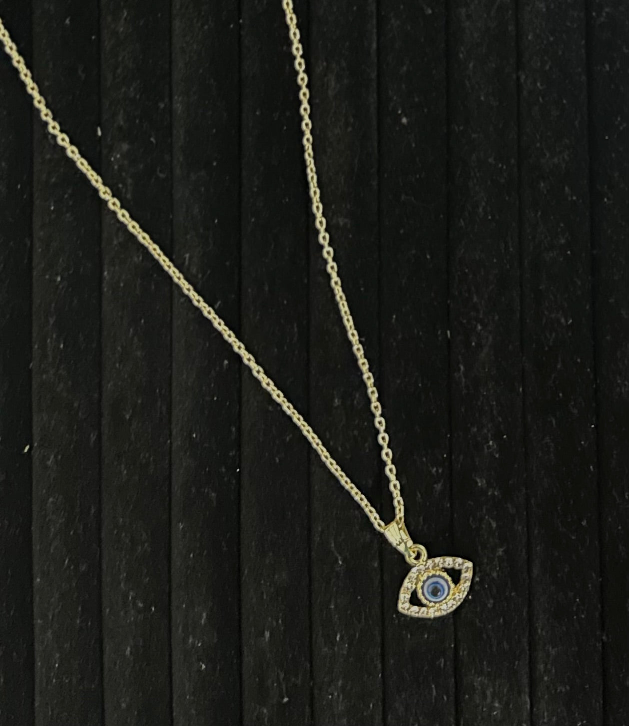 Timeless Guardian: Metal Evil Eye Pendant