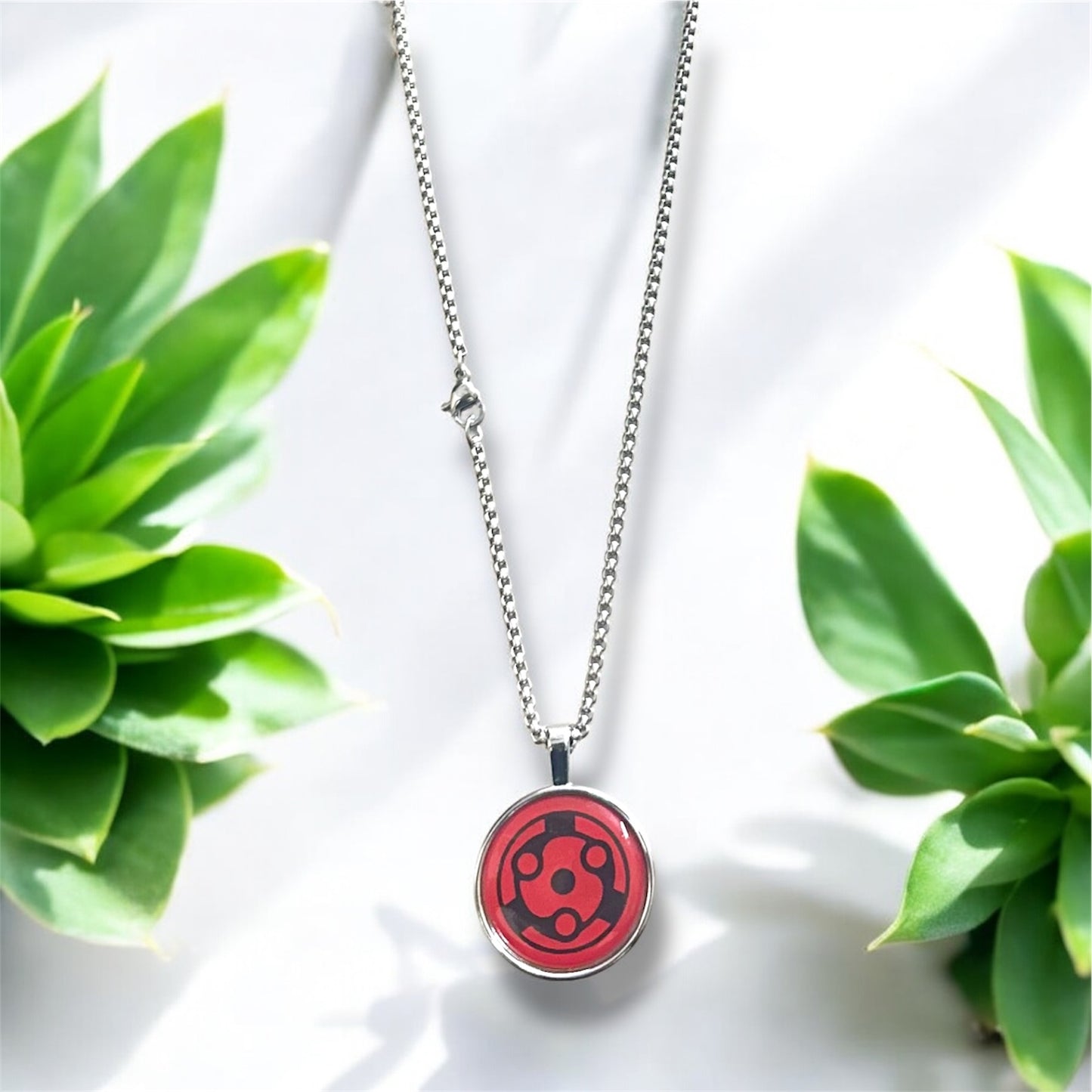 Uchiha Clan Sharingan Necklace – Naruto Inspired Pendant for Anime Fans