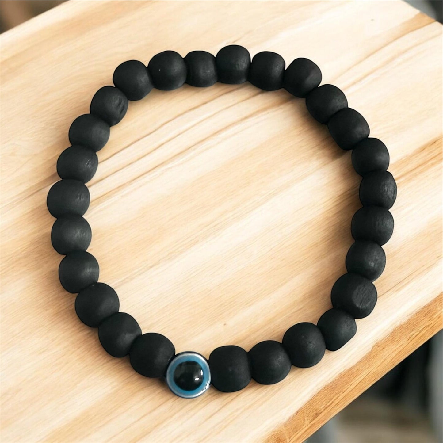 Black Wooden Bead Bracelet with Evil Eye Charm – Adjustable Stretch Bracelet for Men & Women